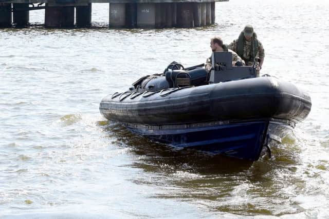 Bomb disposal by the navy team from Portsmouth.