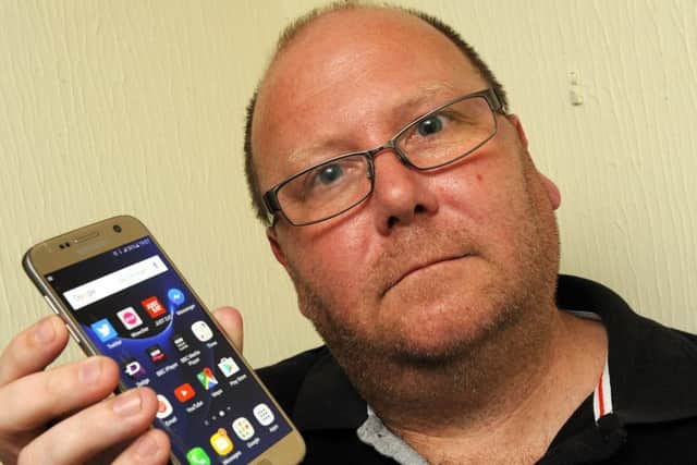 Ross Biggs was left with a faulty phone Picture: Malcolm Wells (160809-1816)