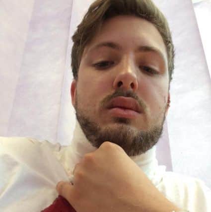 Owen Scrivens, 19, from Felpham, had his throat slit by a shard of glass when a biker smashed off his wing mirror in a suspected road rage incident. Y26XRFCqx9Q1e-wdyRGE
