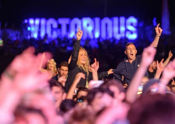 Music fans enjoy Tinie Tempah at last year's Victorious Festival