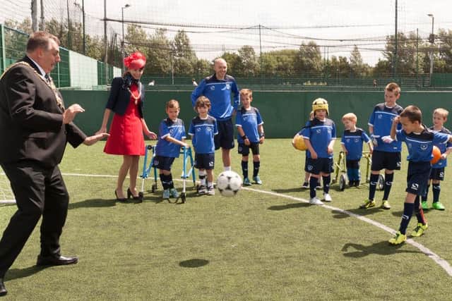 Lord Mayor of Portsmouth Cllr David Fuller on the receiving end of a penalty kick by Jack Hindle at a Pompey in the Community event this summer
Picture: Keith Woodland (160946-051)