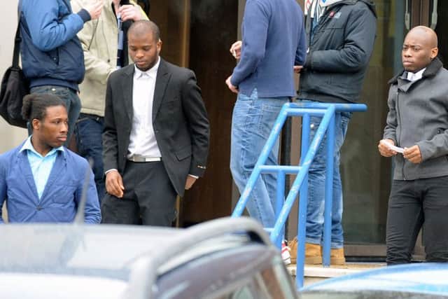 From left: Amizion Rosario, Wyslander Rosario and Raniur Marques leaving Portsmouth Magistrates Court after a previous hearing
