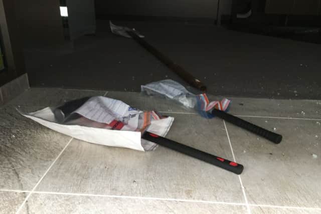 Pictured: Sledgehammers left at Ernest Jones where thieves stole a 'significant' amount of jewellery. Thieves raided Ernest Jones in Cascades Shopping Centre in Portsmouth on July 26. Picture: Ben Fishwick PPP-160726-142135001