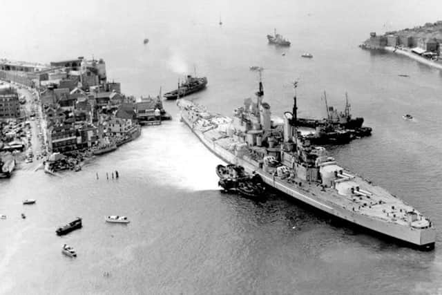 Most views of HMS Vanguard are overhead, here is another, with a view along Broad Street.
