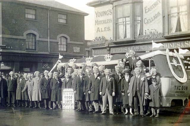 Customers outside the Eastney Cellars, Cromwell Road, Portsmouth, ready to board their bus in 1939 for the trip of a lifetime to see Pompey win the FA Cup at the third attempt