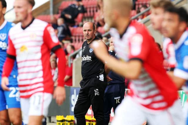 Pompey boss Paul Cook watches on at Gresty Road    Picture: Joe Pepler