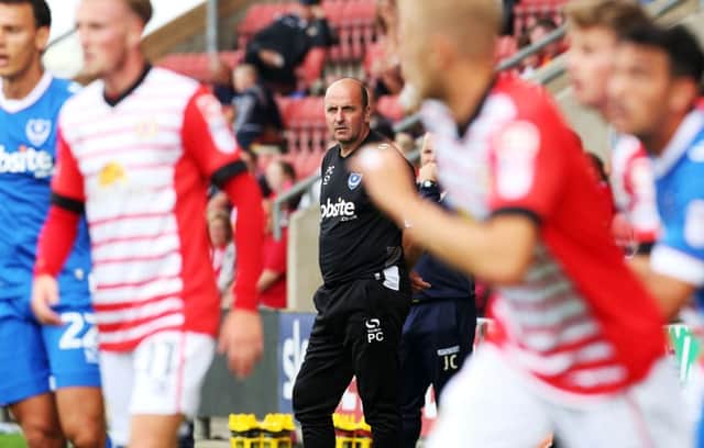 Pompey boss Paul Cook watches on at Gresty Road    Picture: Joe Pepler
