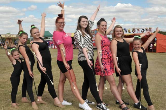 Fun Day co-organiser Helen Dunn poses with members of the Saltire Twirlers who performed on the day Picture: Mick Young (161075-05)