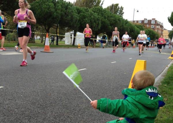 jpns17-08-16-010 parents doing gsr with Sebby Fyans rep ep**AWAITING CAPTIONS***Caption: Three-year- old Sebby Fyans, from Portsmouth, will take on the Mini Great South Run to support the Portsmouth Down Syndrome Association,From: Jennifer Tomlin 