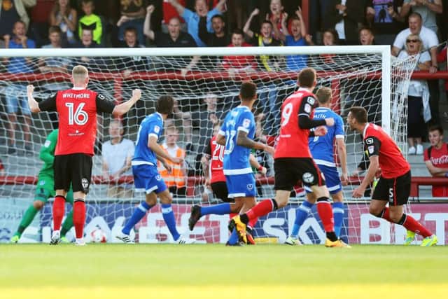 Ryan Edwards scores Morecambe's opening goal Picture: Joe Pepler