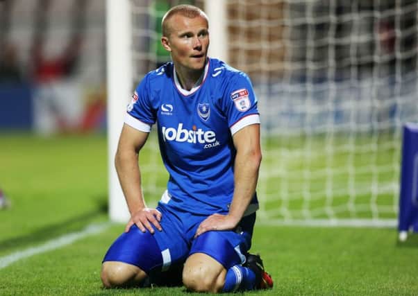 Curtis Main looks dejected after Pompey slipped to defeat at Morecambe Picture: Joe Pepler