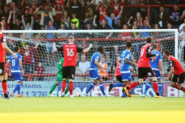 Ryan Edwards hands Morecambe the lead against Pompey at the Globe Arena last night