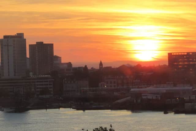 Picture of sunrise over Portsmouth Harbour by Peter Maguire