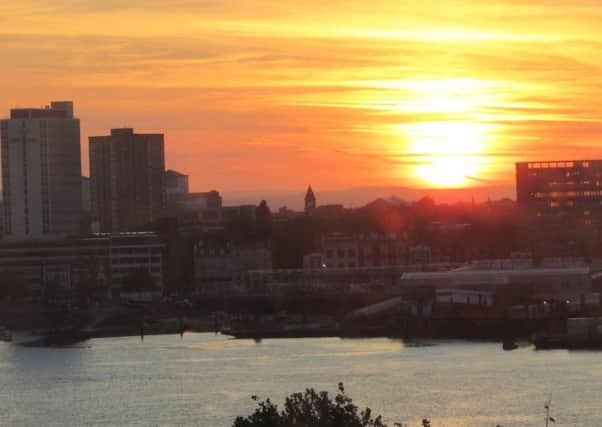Picture of sunrise over Portsmouth Harbour by Peter Maguire