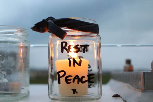 One of the tributes left in memory of the airshow tragedy's victims last year