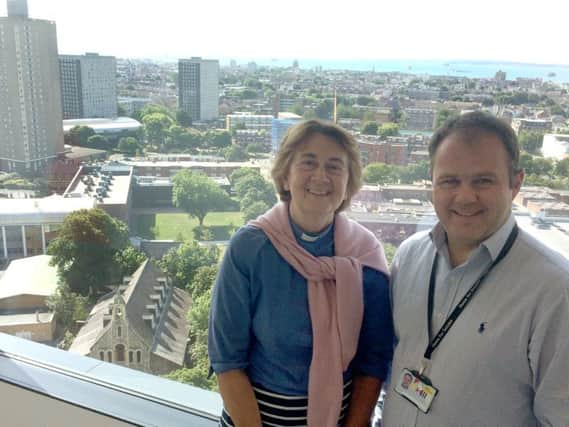 WELCOME: Annie McCabe and Martin Griffiths in the new student halls overlooking the church