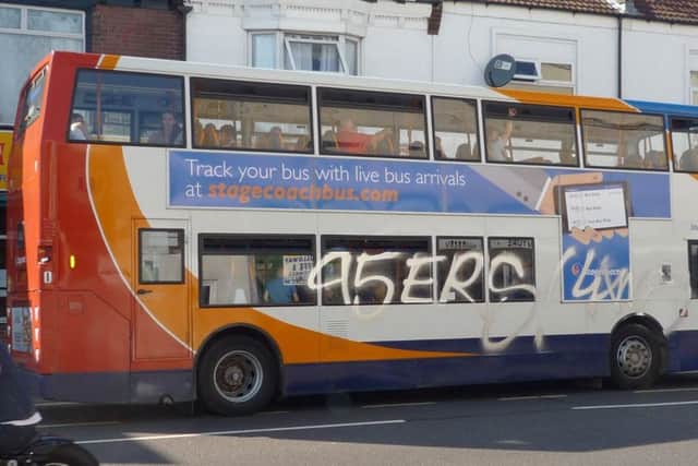 A vandal spray-painted a bus in London Road on August 17. Picture: Ian Cope