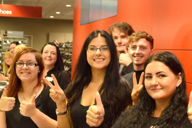 The new team of checkout staff at TK Maxx in Portsmouth Picture: David George.