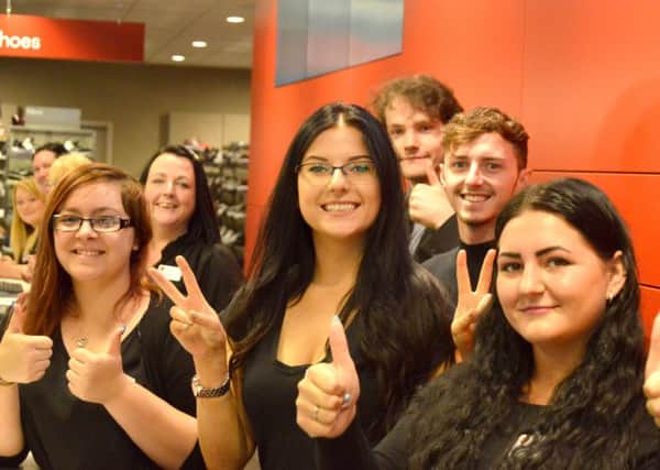 The new team of checkout staff at TK Maxx in Portsmouth Picture: David George.