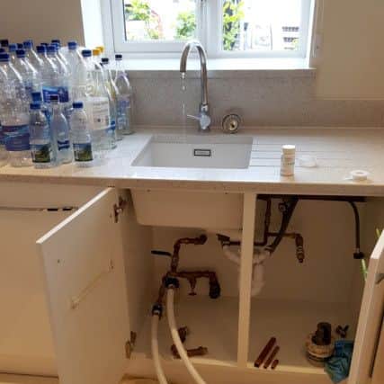 The pipes being cleaned in Miss Davis' home