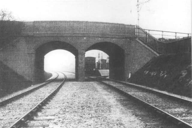 UNDER The East Southsea branch line passing under Albert Road with Albert Road Halt seen through the arch