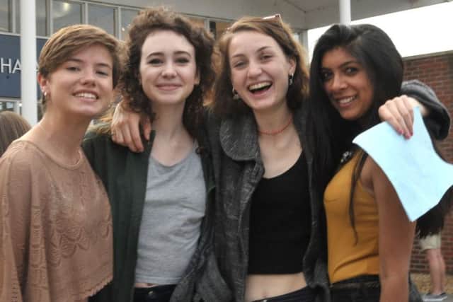 From left,
Georgina Pine, 19, Ele Marchant, 19, Ella Davidson, 18, and Radhika Parekh, 18 celebrate after getting their results at Havant Sixth Form College
Picture: Mick Young (161079-06)