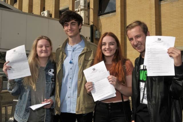 Classics students Sian Damarell, 18, Matt Douglas, 18, Maura Lindsay, 18, and Ryan Harris, 18, get their results
Picture: Mick Young (161080-02)