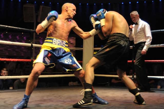 Dave Birmingham in action against Kas Hussain. Picture: Mick Young (160773-02)