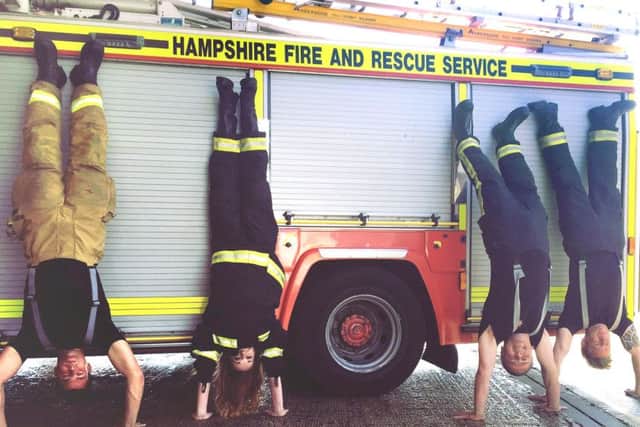 Justine Allingham finishes her handstand challenge