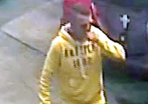Police have released a CCTV image of a man they would like to speak to about a burglary at Mew Garage, in Clarence Road, Southsea