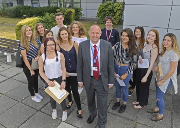 St Vincent College principal Matt Atkinson and students who got their A-level results this week 
Picture Ian Hargreaves (161108-3)
