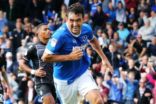 Gary Roberts celebrates scoring his and Pompey's first goal from the penalty spot in the Blues' 2-0 win over Colchester on Saturday   Picture: Joe Pepler