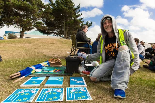 John Green with artwork at Hampshire Cannabis Community's protest in Southsea on Saturday