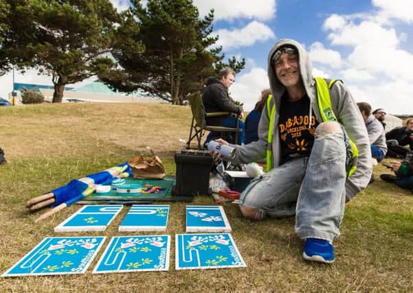 John Green with artwork at Hampshire Cannabis Community's protest in Southsea on Saturday