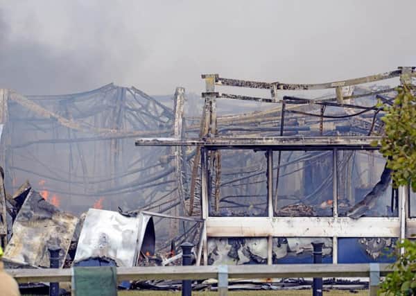 The burnt-out shell of the school building Picture: Victoria Jones/Solent News & Photo Agency 
UK