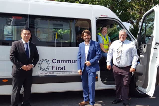 Alan Mak MP with Community First Chief Executive Tim Houghton and some of the team
