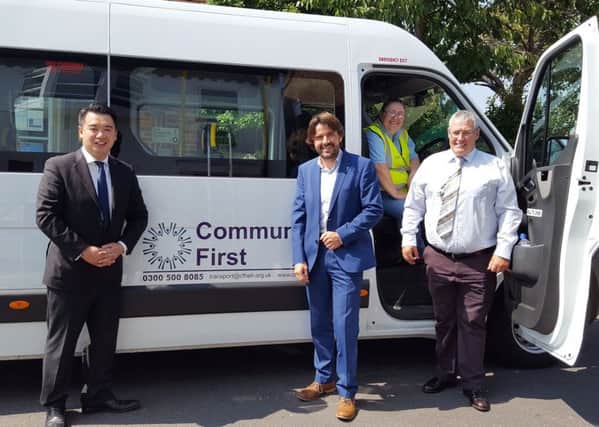 Alan Mak MP with Community First Chief Executive Tim Houghton and some of the team