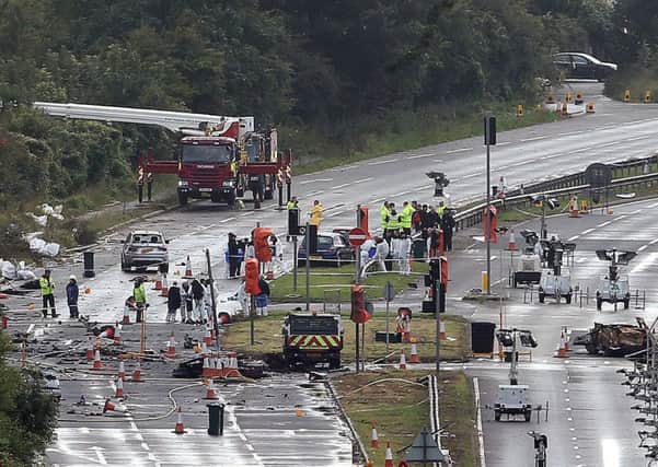File photo dated 26/08/15 of emergency services working on the A27 at Shoreham in West Sussex following the Shoreham air disaster.
Picture: Steve Parsons/PA Wire