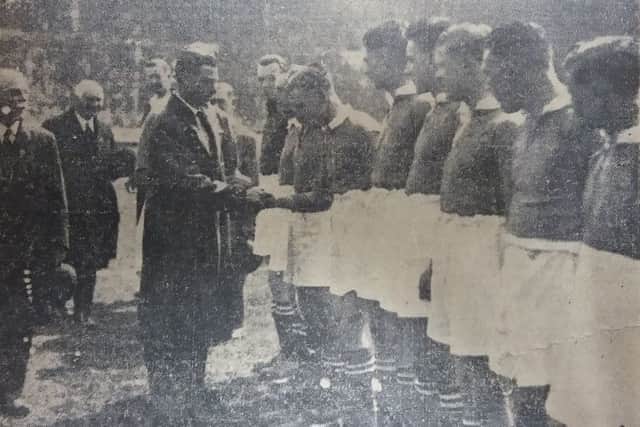 Pompey players meet the Prince of Wales prior to kick-off at Wembley