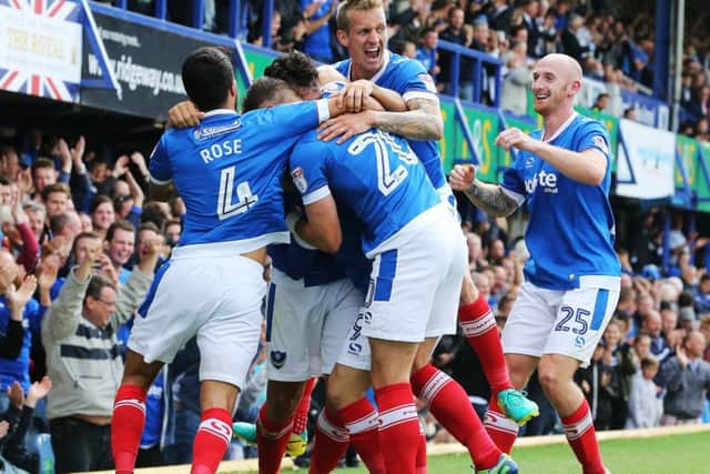 The Pompey players celebrates Gary Roberts' opener Picture: Joe Pepler PPP-160820-165321006