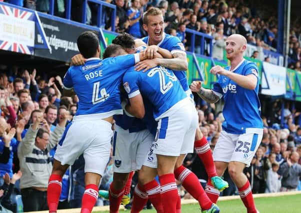 The Pompey players celebrates Gary Roberts' opener Picture: Joe Pepler PPP-160820-165321006
