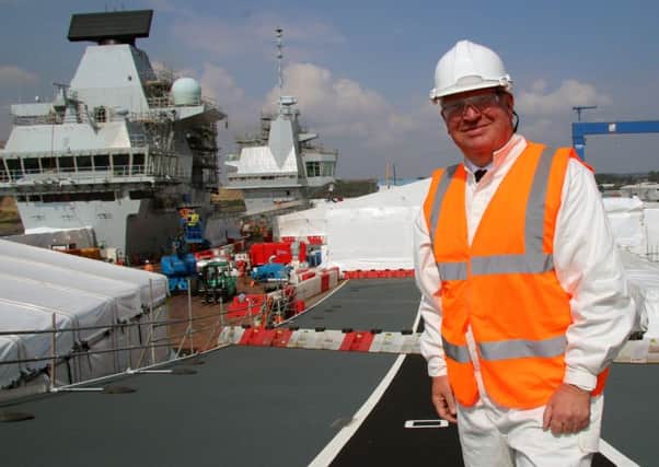 Armed forces minister Mike Penning in Rosyth to see the Portsmouth-bound Queen Elizabeth-class aircraft carriers Picture: CPO Kenny Dunlop RN