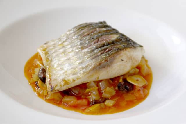 Grey mullet with spicy tomato sauce.