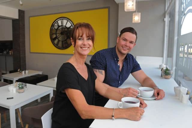 Supervisor Sue Lynn and owner Ben Brades at The Cinnamon Cafe in Southsea Picture Ian Hargreaves (161085-5)