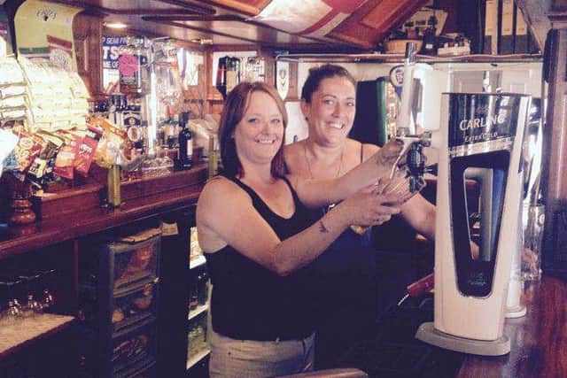 Mr Pickwick pub landlady Nicky Richardson, front, and barmaid Rachael