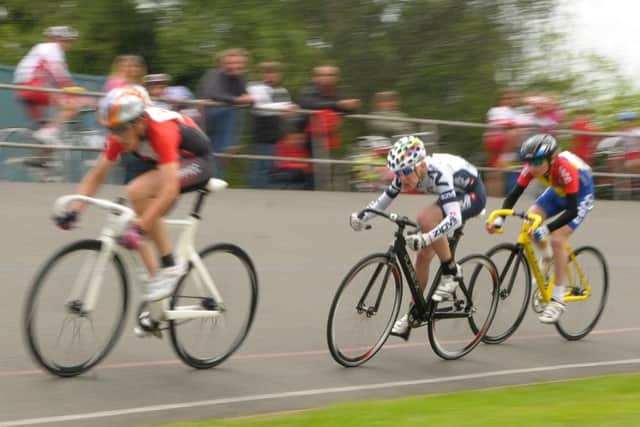 Cyclists at the velodrome at the Mountbatten Centre