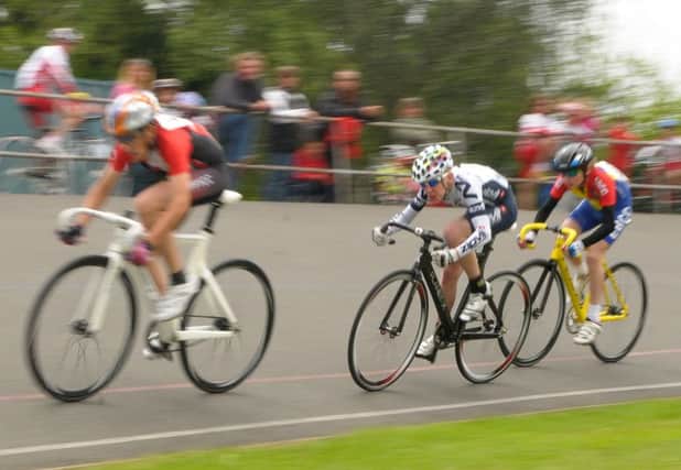 Cyclists at the velodrome at the Mountbatten Centre