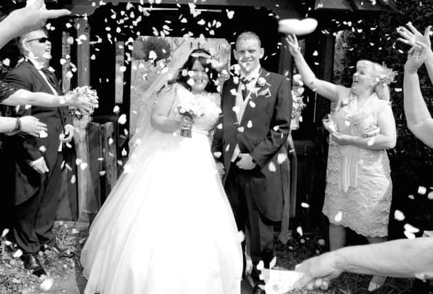 Lee and Zoe married at All Saints' Church in Catherington. Picture: markrobbinsphotography.co.uk.
