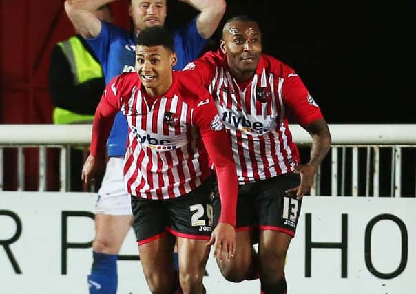 Ollie Watkins, left, scored a last-gasp leveller against Pompey last season at St James Park Picture: Joe Pepler