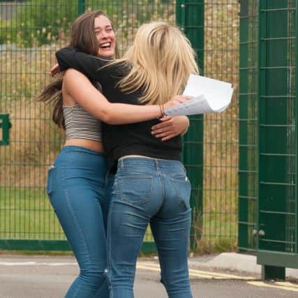 Holly Brailey celebrates with her friend Jazz Hall (161232-8233)